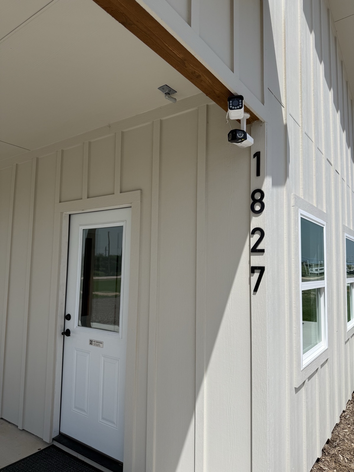 Covered entrance at Shade Stop RV of Floresville, 1827 Hwy 97 E, with security cameras